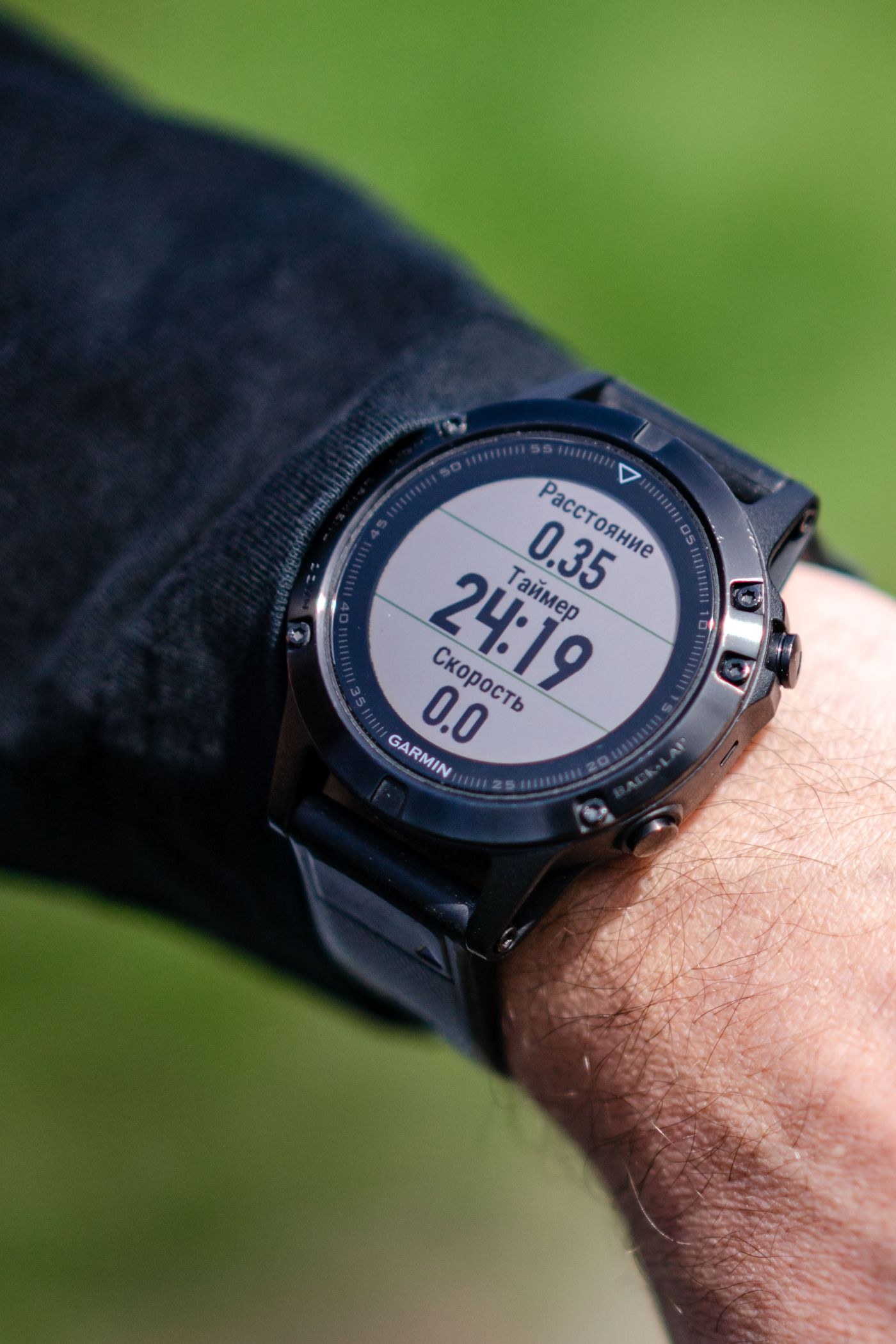 A sports watch showing elapsed time and activity data.